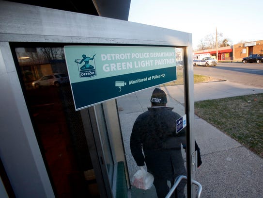 A customer walks out of Southern Smokehouse on West McNichols Road in Detroit, Michigan, on Thursday, April 19, 2018.
This carryout BBQ restaurant participates in the Detroit Police Green Light program. This restaurant has four cameras that are connected to the Detroit Police.