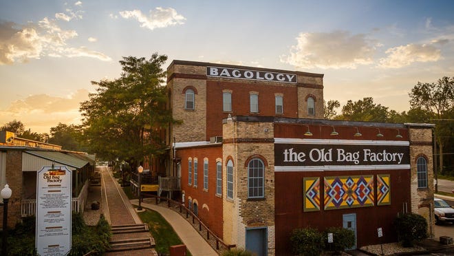 The Old Bag Factory in Goshen houses two floors of shops, restaurants, galleries and studios. A metal sculptor uses the factory’s former boilerhouse as a studio.