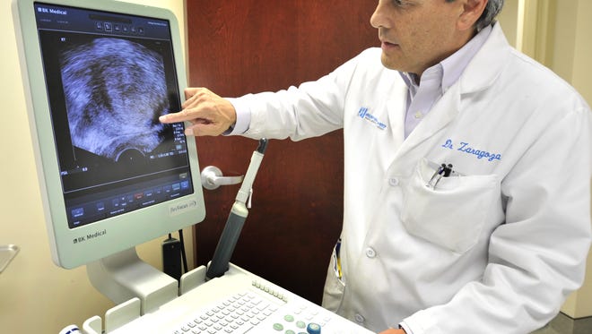 Urologist Dr. Michael Zaragoza at his Dover office in 2016 with ultrasound equipment he uses to detect and treat prostate cancer patients.  Zaragoza is working with the Delaware Prostate Cancer Coalition to raise awareness of the disease. Gary Emeigh/Special To The News Journal