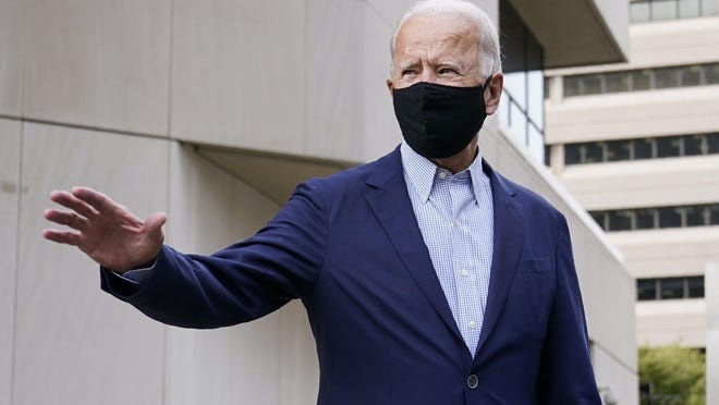 Democratic presidential candidate Joe Biden departs after voting early in Delaware's state primary election.