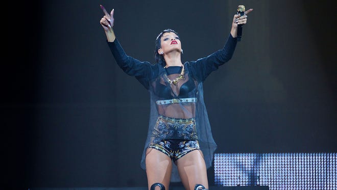 Rihanna performs live for fans at the first show of her Australian tour at Perth Arena on Sept. 24, 2013, in Perth, Australia.