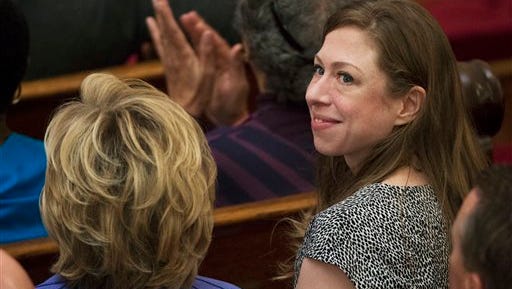 FILE - in this Sept. 13, 2015 file photo, Chelsea Clinton, right, daughter of Democratic presidential candidate Hillary Rodham Clinton, left, sits with her mother in Washington.  Chelsea Clinton says it's surprising to hear that her mom is slipping in the polls because she's "my hero." The young Clinton, who has a daughter of her own, says she believes that as more Americans get a chance to hear from Hillary Rodham Clinton they will understand "why I believe so strongly that she would make a great president."