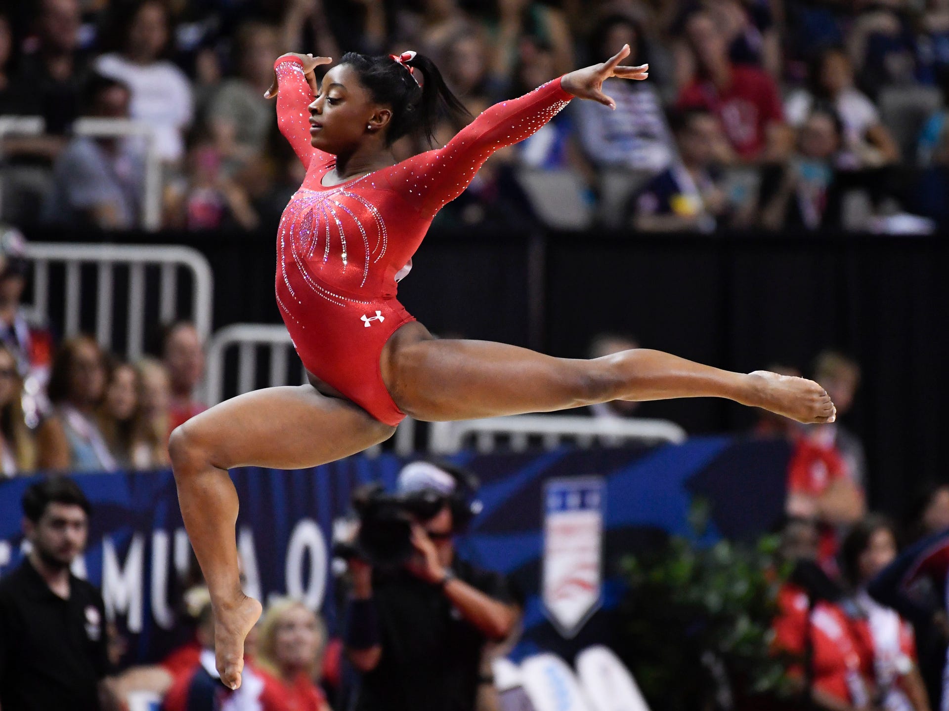 Olympic woman. Olympic Gymnastics Arena. American woman gymnastic Champion Simone biles muscle.