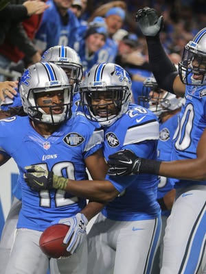 Lions receiver Andre Roberts celebrates his punt return for a touchdown against the Jacksonville Jaguars on Nov. 20, 2016 at Ford Field in Detroit.