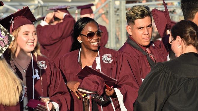 Bastrop High School seniors enjoy their moment at their commencement ceremony June 5 at Memorial Stadium. See more photos at