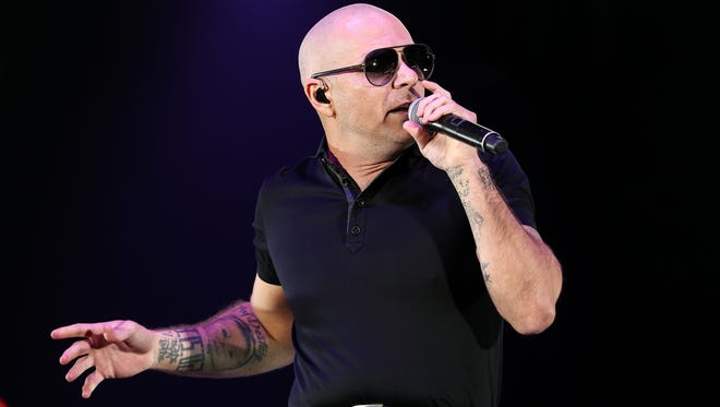 Pitbull performs at the fourth annual "We Can Survive" Concert held at the Hollywood Bowl on Oct. 22, 2016, in Los Angeles. He is headlining the Wawa Welcome America fest.