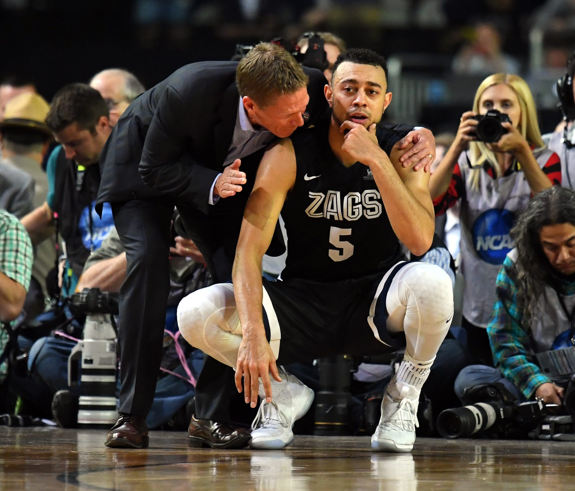 Gonzaga Bulldogs guard Nigel Williams-Goss (5) reacts with head coach Mark Few after loosing to the North Carolina Tar Heels in the championship game of the 2017 NCAA Men's Final Four at University of Phoenix Stadium.