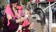 Jennifer Brossart, of Globe, feeds an emu, during the