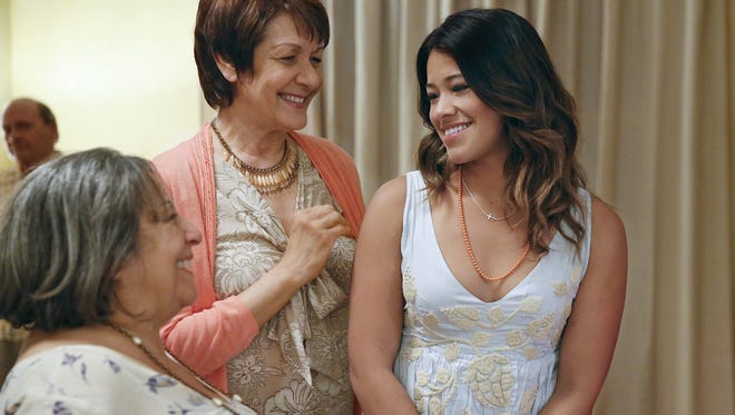 
Gina Rodriguez, right, is “Jane the Virgin.”
