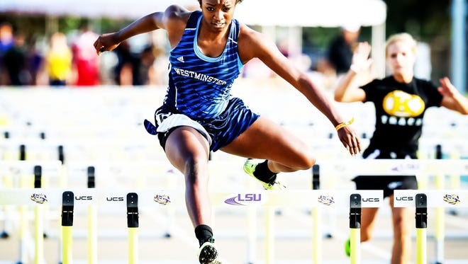 Mike Curley, Special to the Daily World
Westminster?s Ivy Cains wins the 100 hurdles at the Class 2A state track meet Friday in Baton Rouge.