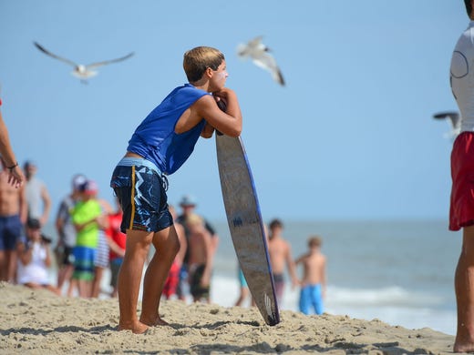 Jack Lee, Rehoboth, waits for the perfect wave during