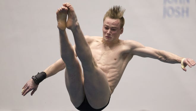 Purdue's Steele Johnson works on winning the 1 meter diving title Thursday night in Indianapolis.