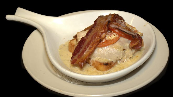 The Kentucky Hot Brown is a baked or broiled open-faced turkey sandwich.