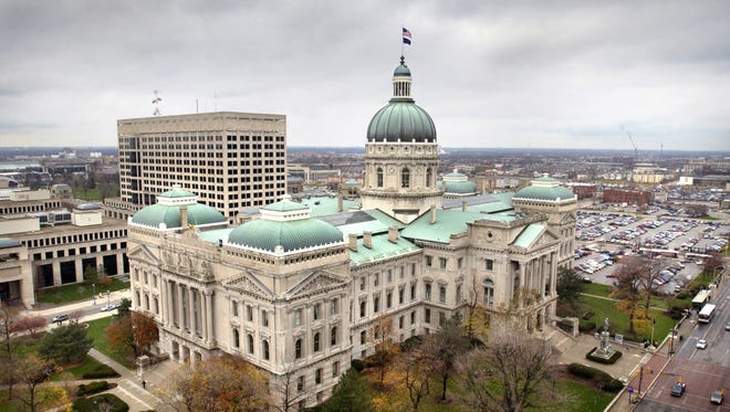 The Indiana Statehouse is seen looking off the roof of the Capitol One Building over the corner of Capitol and Washington avenues.