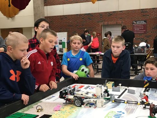 The Mishicot Middle School Robotics Team in action.