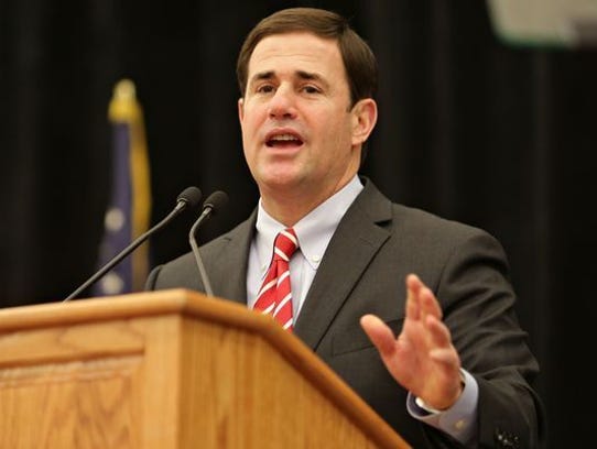 Gov. Doug Ducey plans to keep nearly $14,000 in donations