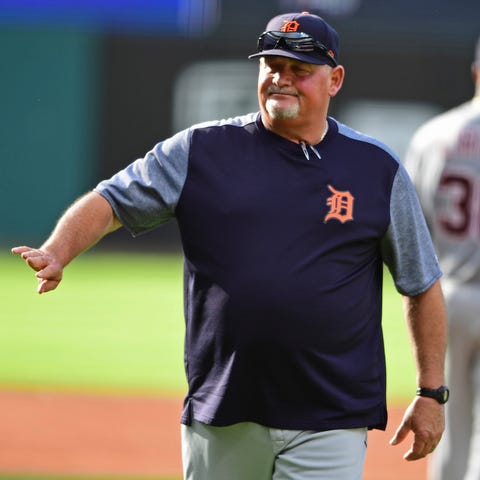 Detroit Tigers pitching coach Chris Bosio reacts...