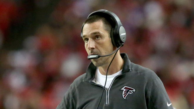 Atlanta Falcons offensive coordinator Kyle Shanahan is shown on the sideline in the third quarter of their game against the Minnesota Vikings at the Georgia Dome.