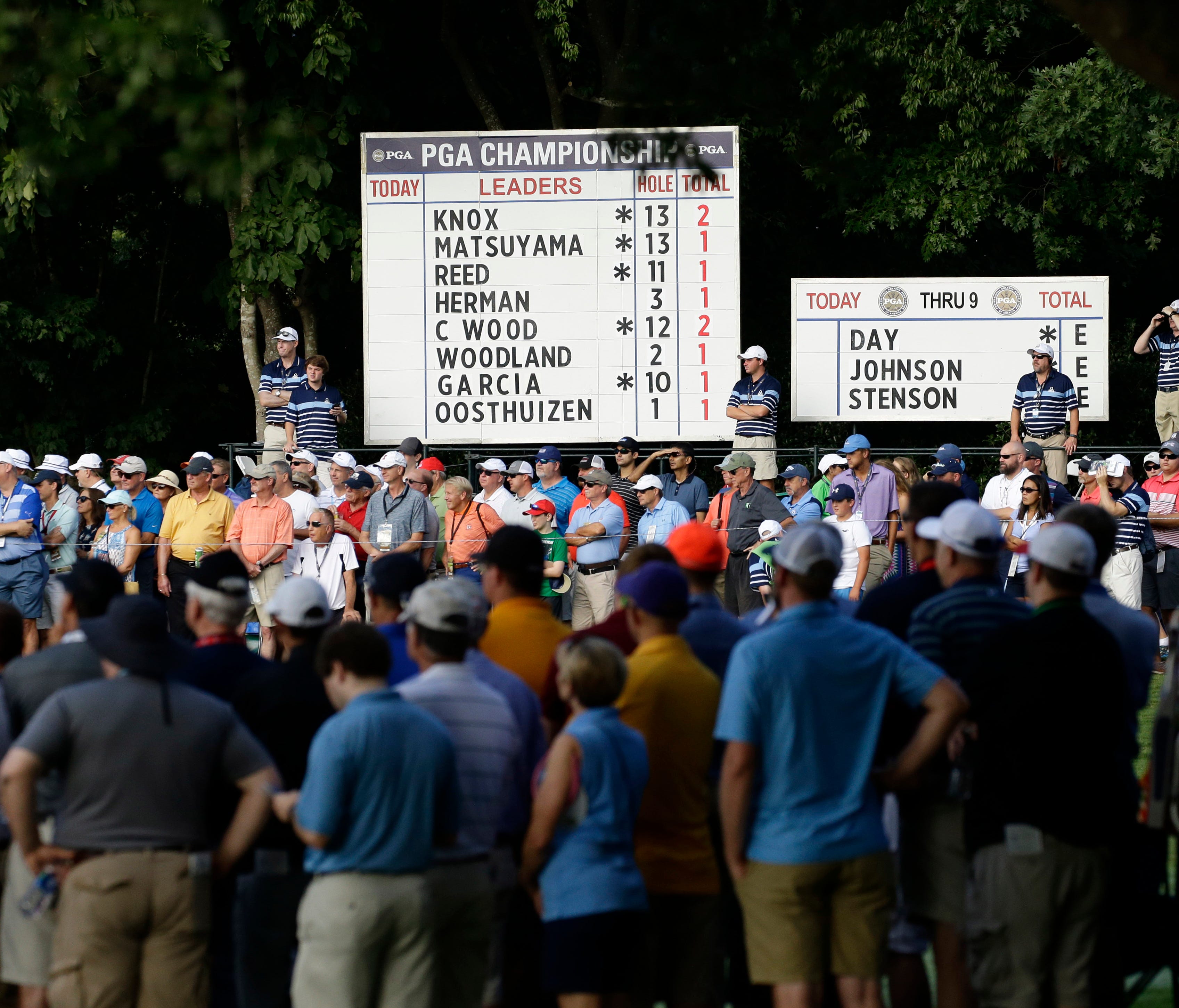 View of fans surrounding the 10th green during the first round of the PGA Championship.