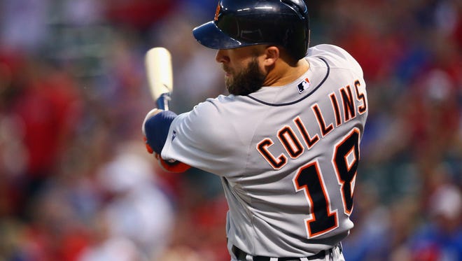 Tigers rightfielder Tyler Collins hits a two-run single in the first inning Wednesday in Arlington, Texas.