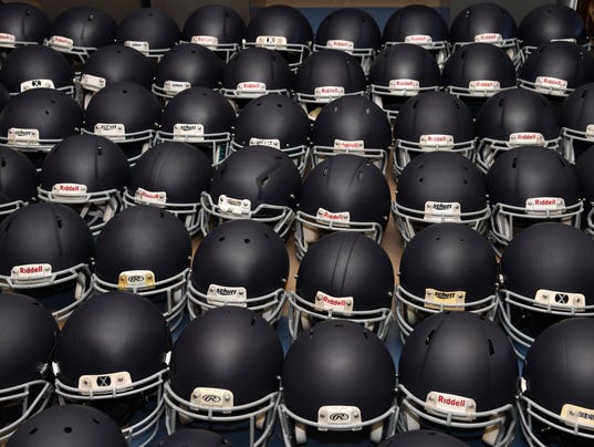 High school football helmets