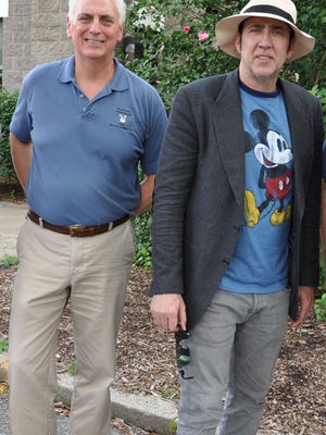 John Walczak, director of the Louisville Zoo, with actor Nicolas Cage. Cage and his son stopped by the Zoo and spent a few hours with the animal ambassadors and toured Glacier Run behind-the-scenes.
