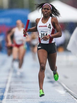 University of Arkansas' Chrishuna Williams anchors their team to a win in the wome's 1600 sprint medley relay Sat. April 25, 2015 at the Drake Relays in Des Moines, Iowa.