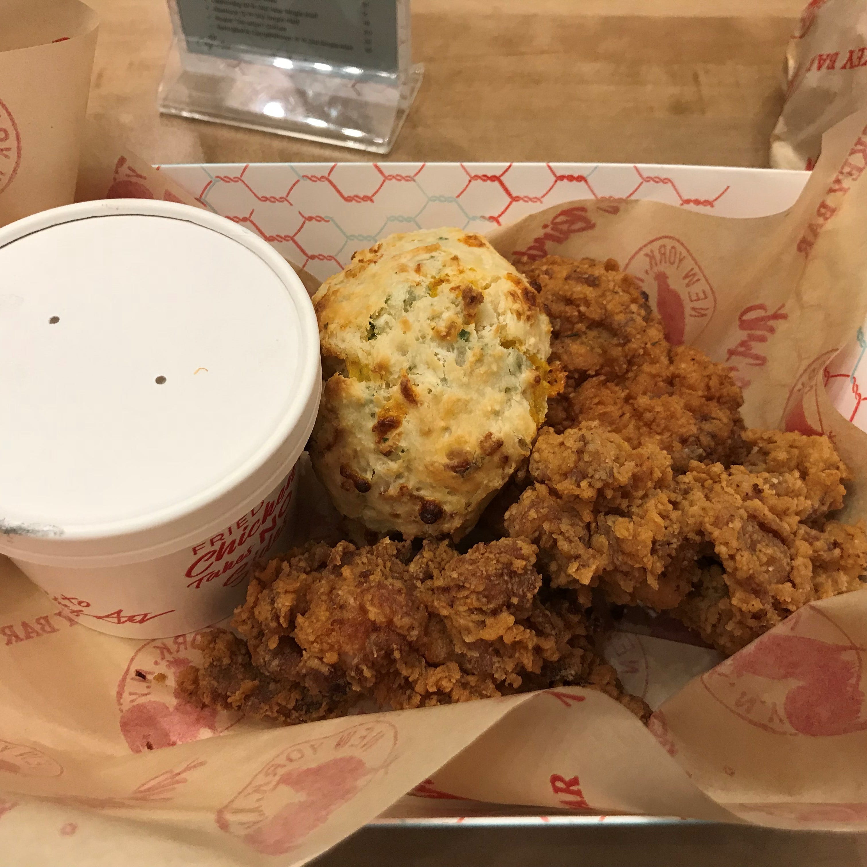 The signature dish is Chef Art's Mix Box, a two-piece serving of light and dark meat fried chicken with a biscuit and choice of side.