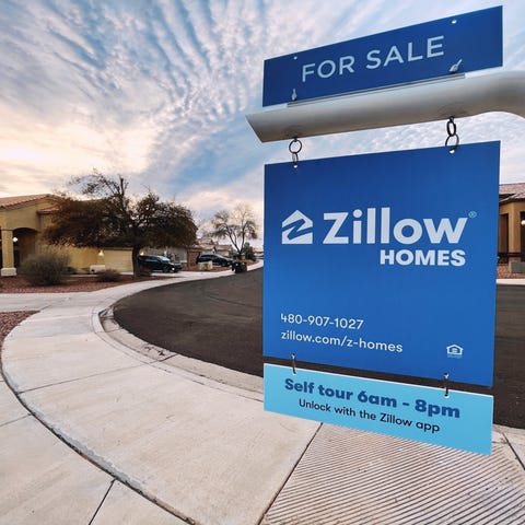 For Sale sign bearing Zillow's brand name.