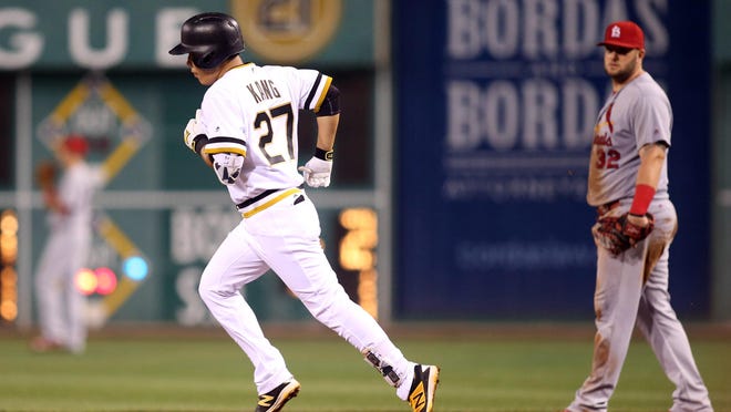 Pittsburgh Pirates’ Jung Ho Kang rounds second base after hitting the eventual game-winning HR in the eighth inning.