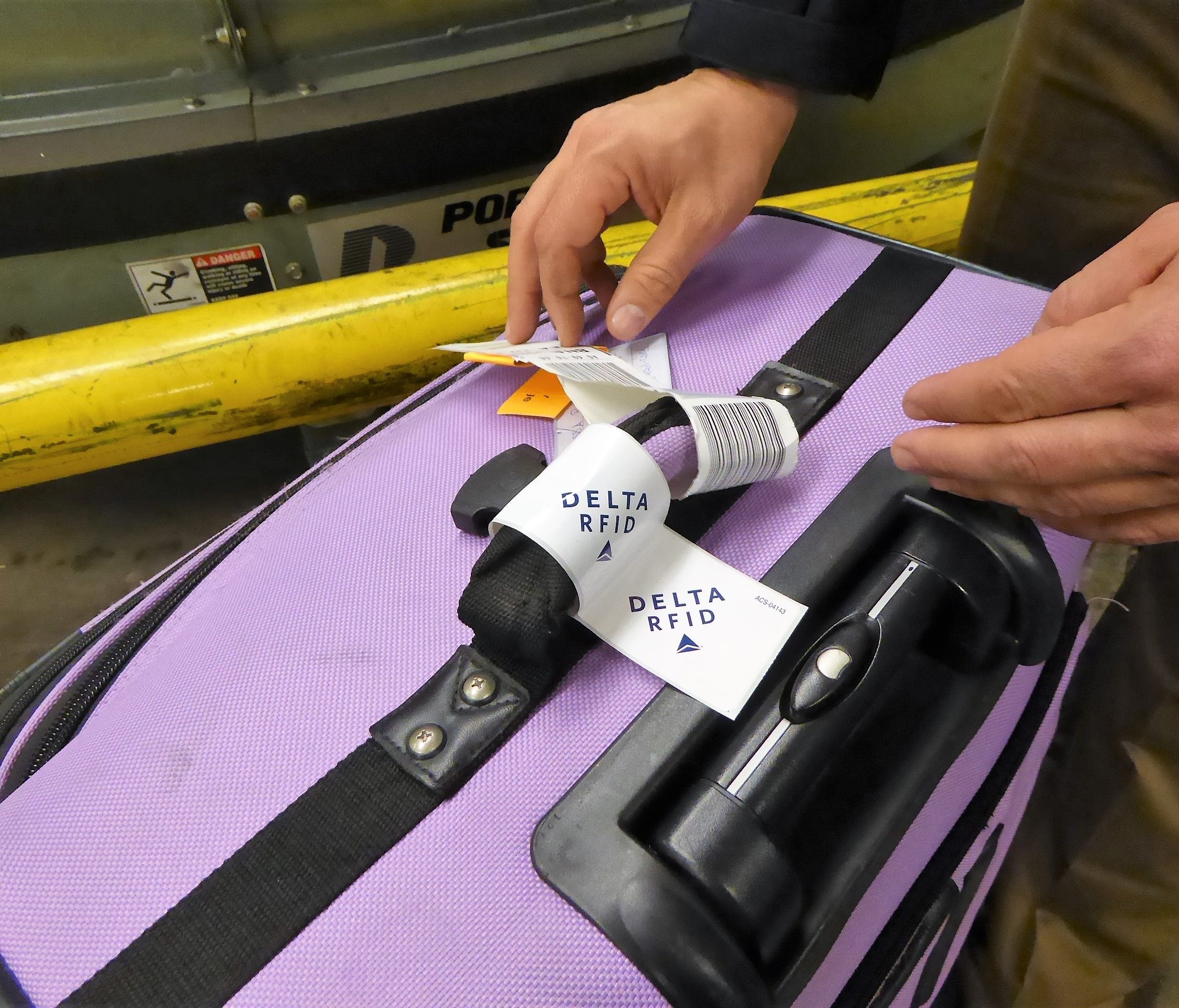 Delta and some other airlines add or embed an RFID tag in addition to the traditional 10-digit luggage label.