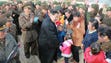  Kim Jong-Un interacting with people while inspecting