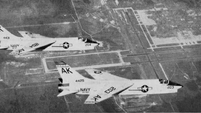 U.S. Navy F8U-1 Crusader fighters from Fighter Squadron VF-62 Boomerangs, Carrier Air Group 10 (CVG-10), over NAS Cecil Field, FL. PHOTO: U.S. Navy Naval Aviation News, August 1962.