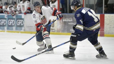 The Americans' Cody Dearing handles the puck during a recent NA3HL Frontier Division match against the Yellowstone Quake at the Ice Plex.
