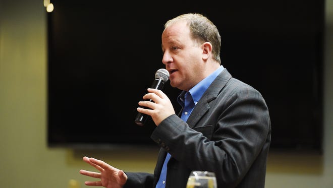 U.S. Rep. Jared Polis speaks at a town hall-style Q&A session at New Belgium last year. Polis recently announced his announced his candidacy for Colorado governor.