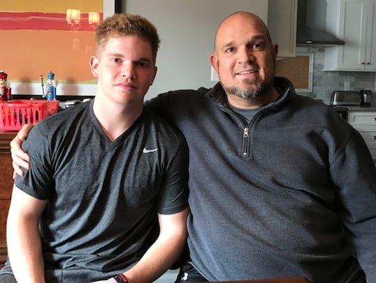 Ben Slaton (left) and his dad Damon Slaton (right).