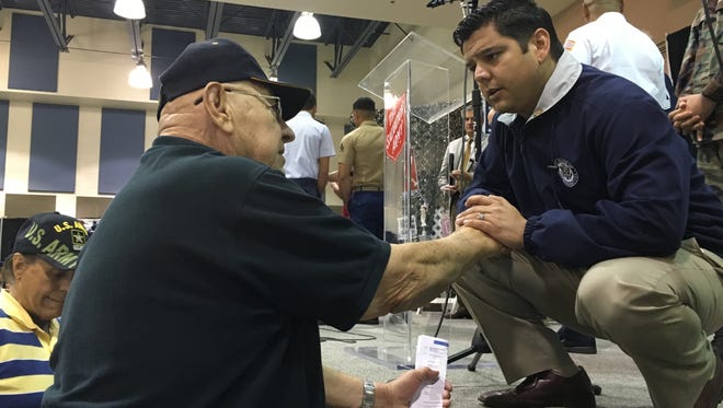 Congressman Dr. Raul Ruiz greets a veteran after his speech at the sixth annual Veteran's Expo on April 2, 2016.