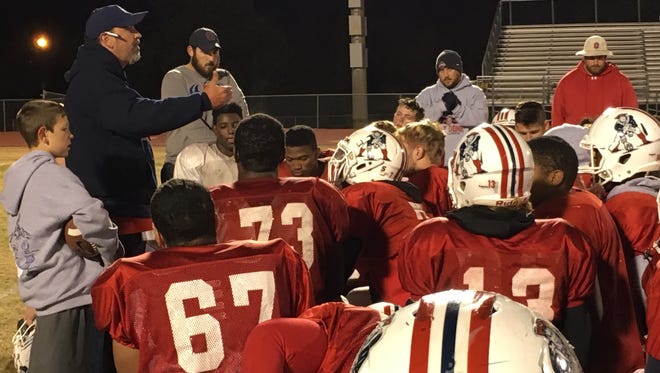 Oakland coach Kevin Creasy talks to his players during Monday's practice. The Patriots play host to Maryville Friday in the Class 6A state semifinals.