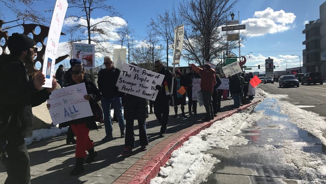 Protesters gathered outside the federal building in Reno on Jan. 24, 2017. The protesters said they planned to be there weekly through the first 100 days of Republican President Donald Trump's presidency.