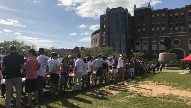 Beta Theta Pi set the record for largest game of Flip Cup with 230 participants