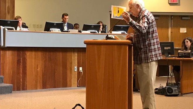 Navarre resident Jim Williams addresses the Santa Rosa County Commission on Monday, April 24, 2017, to express his opposition to relocating a wildlife refuge to Cloptons Circle near his home.