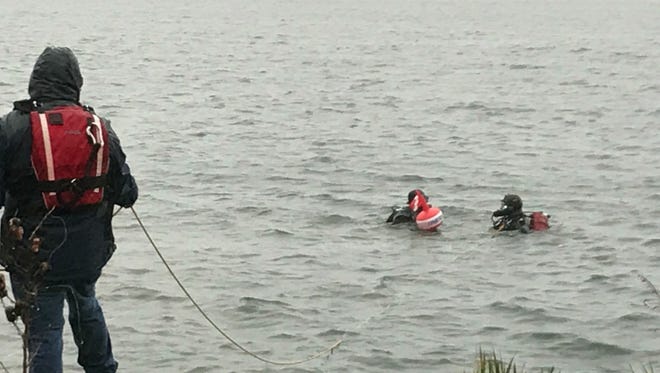 Dive teams from Parsippany Rescue and Recovery, Boonton, Pequannock, and Denville responded to the area and conducted a search. No diver was located and the buoy was removed from the water.