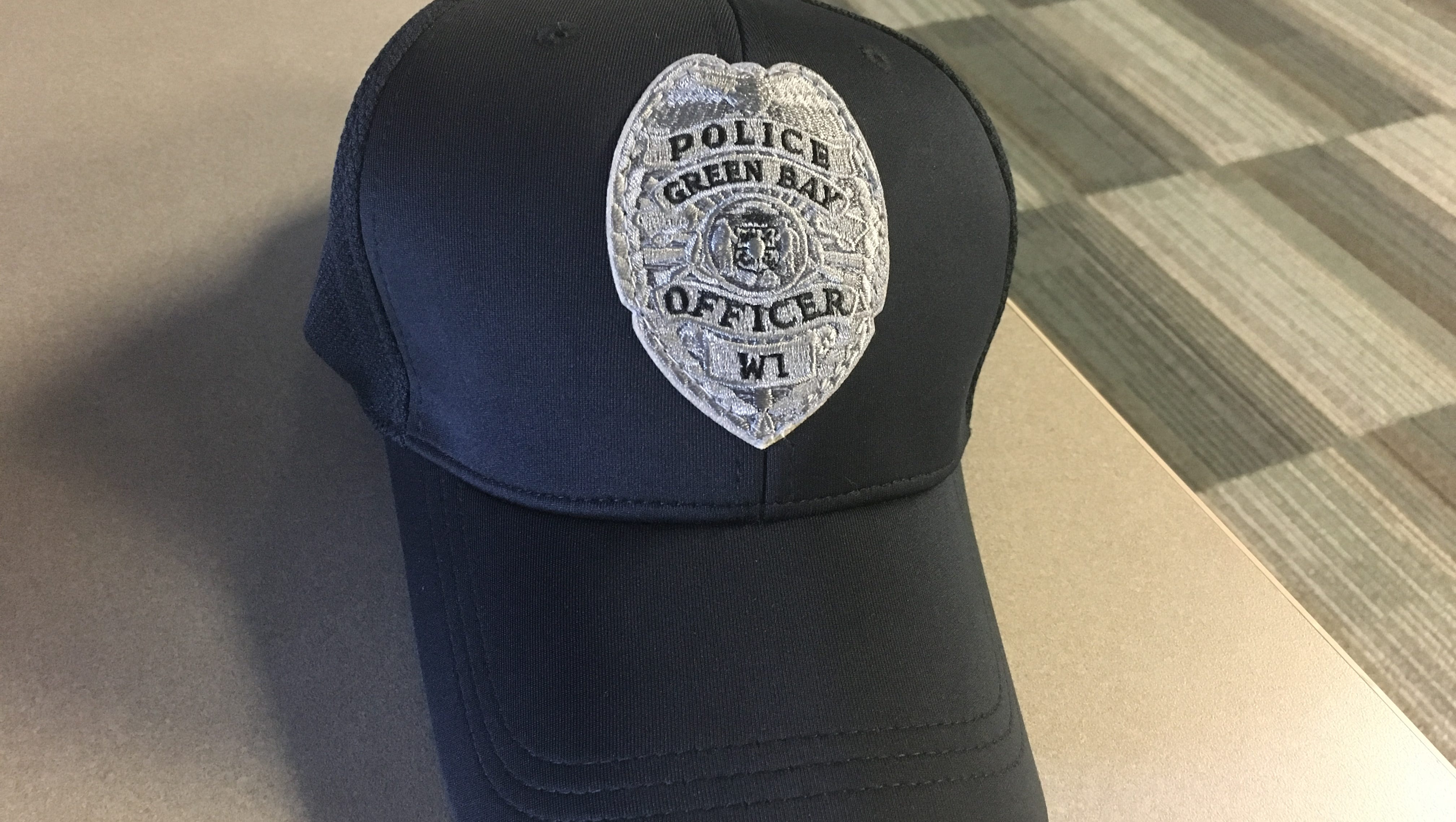 Cops in caps? Whassup with that?