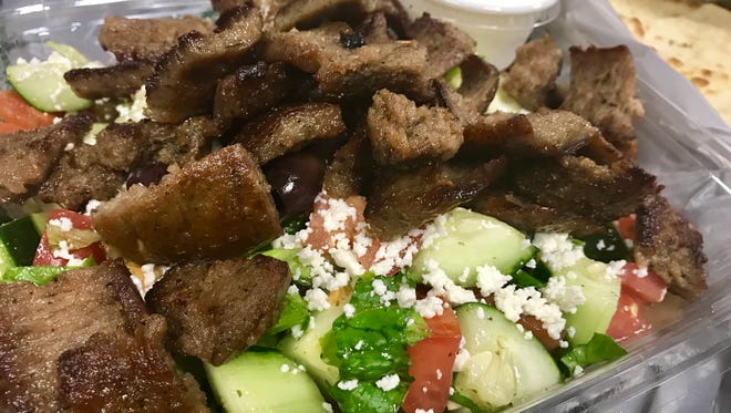 A Greek salad with gyro meat from Opa! Mediterranean Gourmet in Fort Myers.