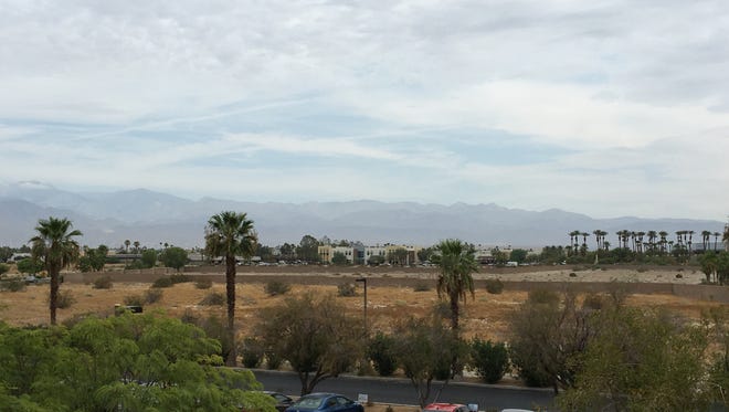 Dark clouds fill the sky above the Coachella Valley Wednesday. Weather experts say there's little chance of rain, though.