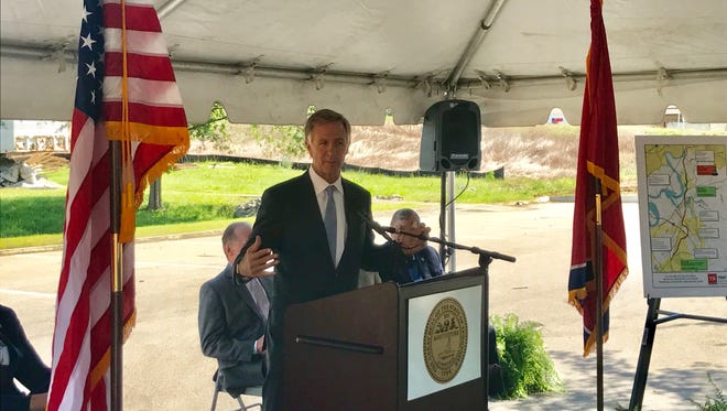 Gov. Bill Haslam announces two new road improvement projects for Alcoa Highway Monday, July 31.