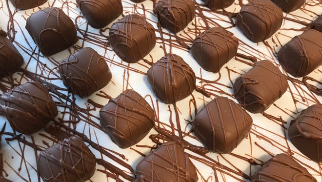 Master's of Confection chocolatier and Haslett resident Konny Zsigo's hand-made chocolate-covered caramels will be on the menu at an artisan dessert shop he and his wife plan to open on Park Lake in Bath Township this December.