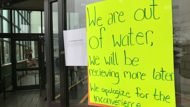 Signs at a Kroger store in Commerce Township inform customers about changes due to the boil water order in Oakland County on Tuesday, Oct. 24, 2017.