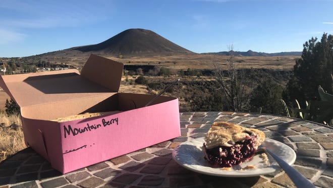 A slice "Mountain Berry" from Veyo Pies is served up in front of the area's iconic Veyo Cinder Cone.
