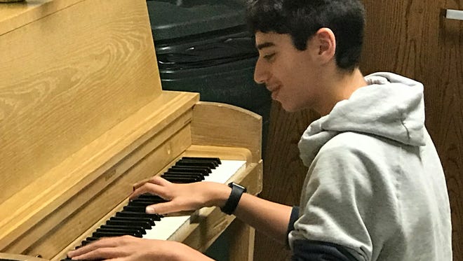 Sophomore Rayda El-Charif played the piano at the assembly.